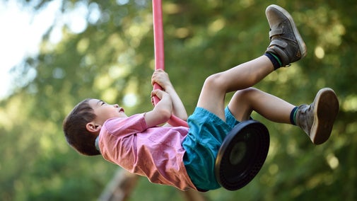 Zooming along the zip wire at Strawberry Castle play area